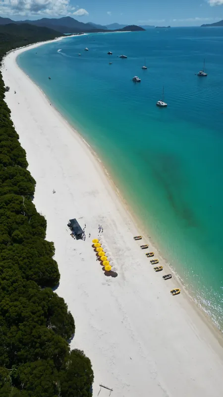 M/Y Alani, a white sand beach from above