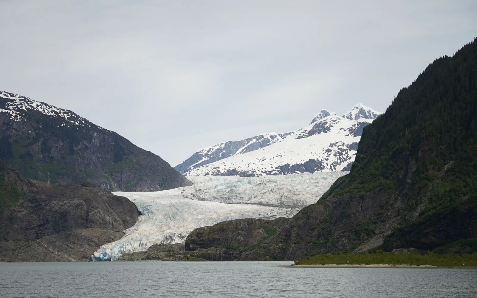 Mendenhall Glacier between mountains near Juneau, Alaska