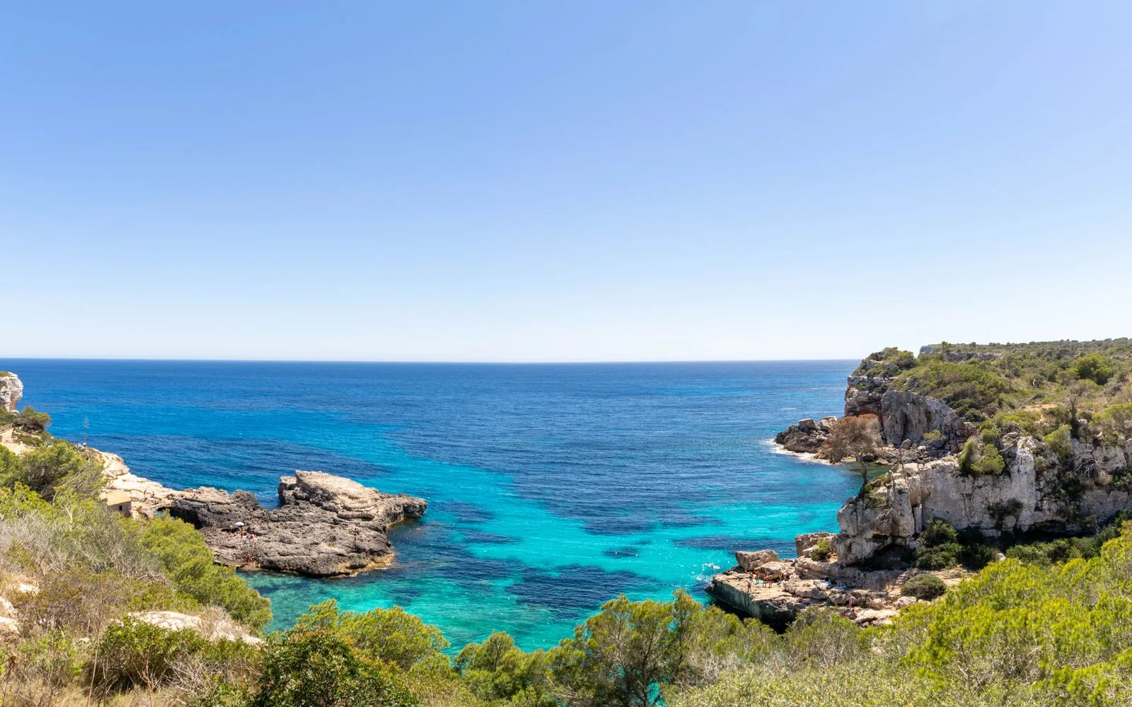 Turquoise sea and cliffs at Sant Antoni de Portmany, Ibiza