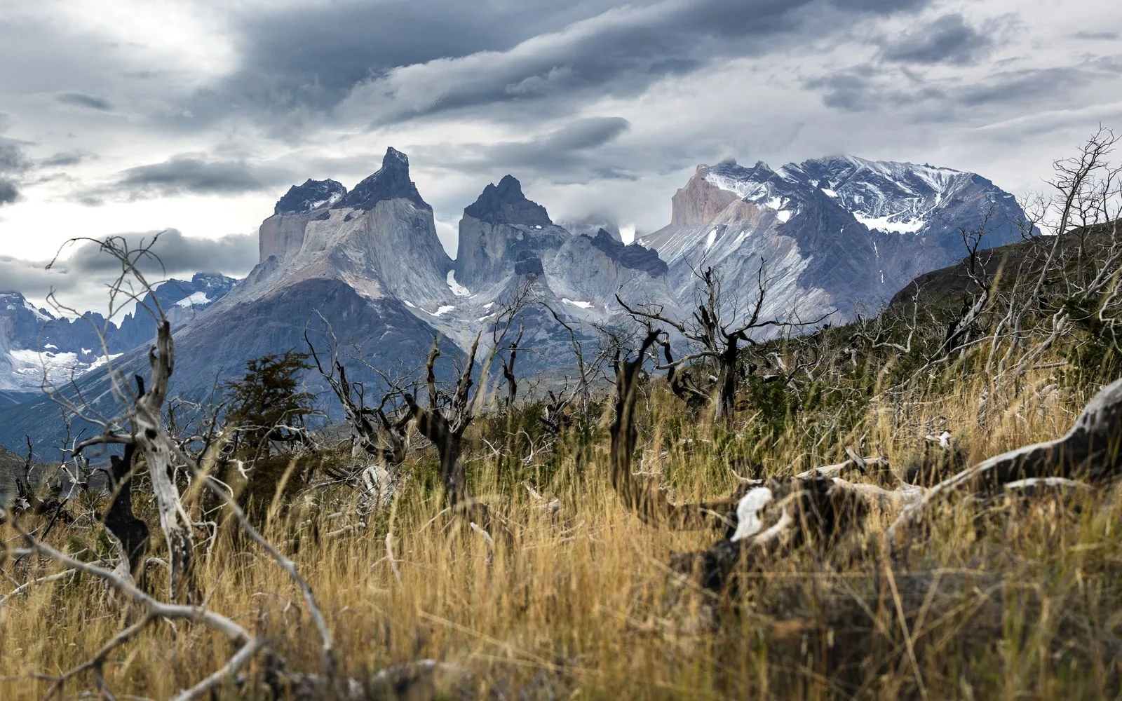 Torres del Paine peaks under dramatic Patagonian cloud