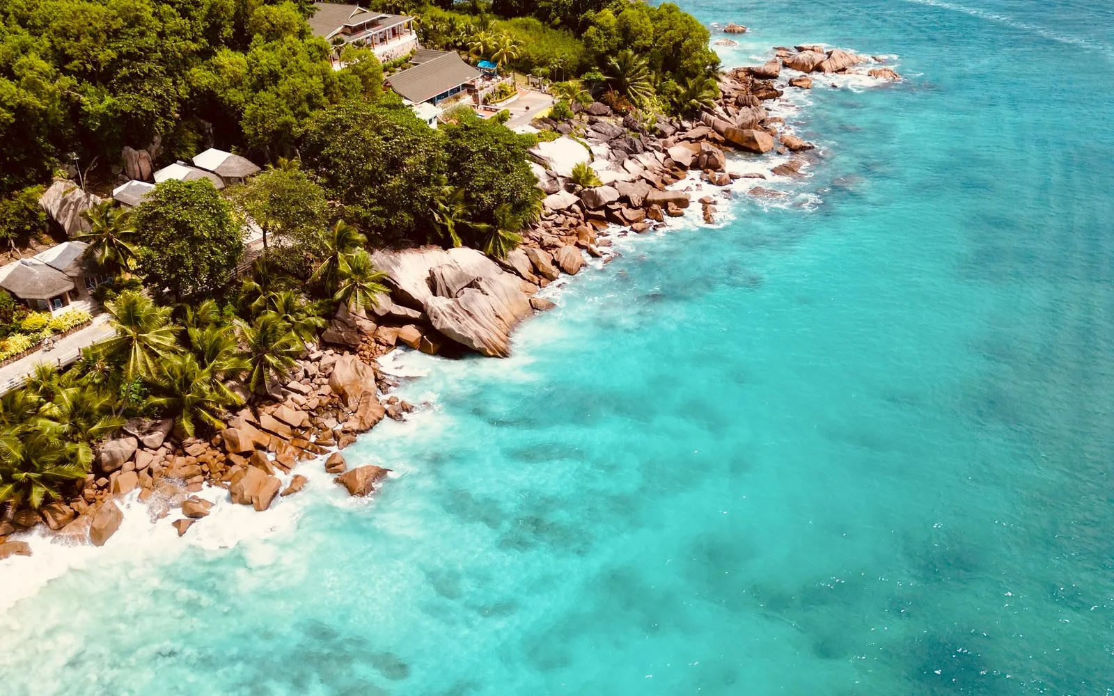 Aerial view of Seychelles coastline and clear water