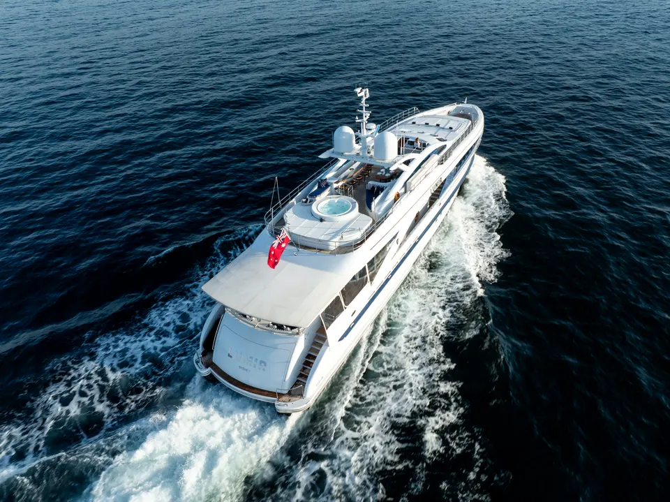 M/Y Lumir, Aerial of Lumir cutting a white wake
