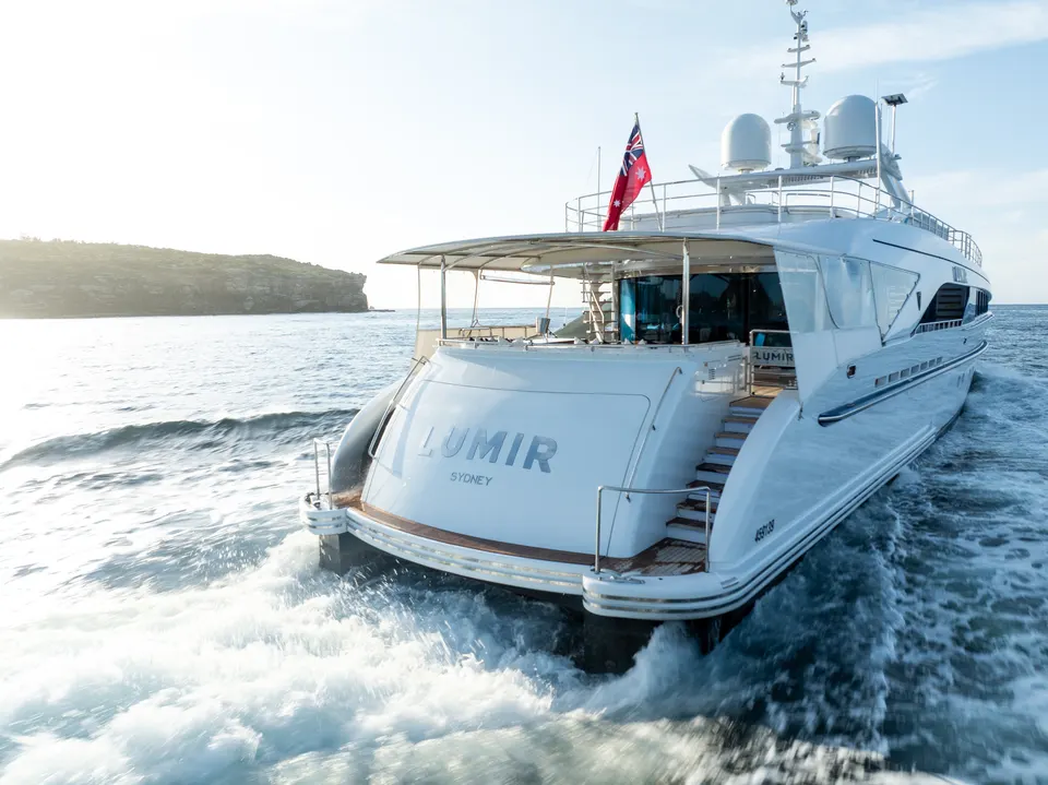 M/Y Lumir's stern quarter and aft decks at speed