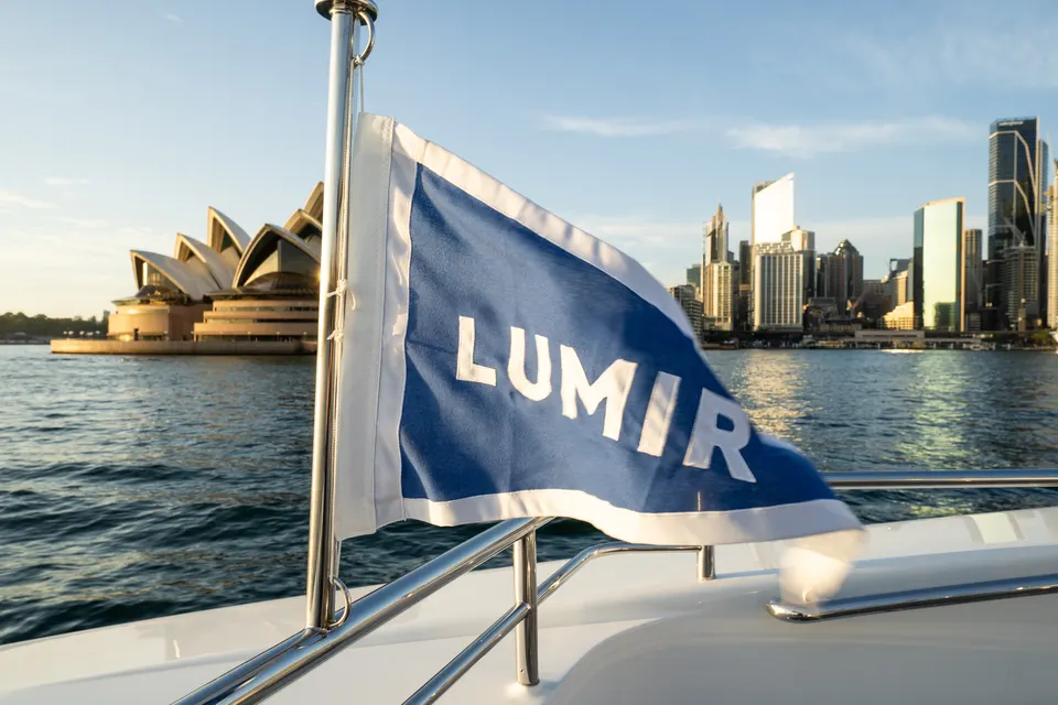 M/Y Lumir, The Lumir flag with the Opera House beyond