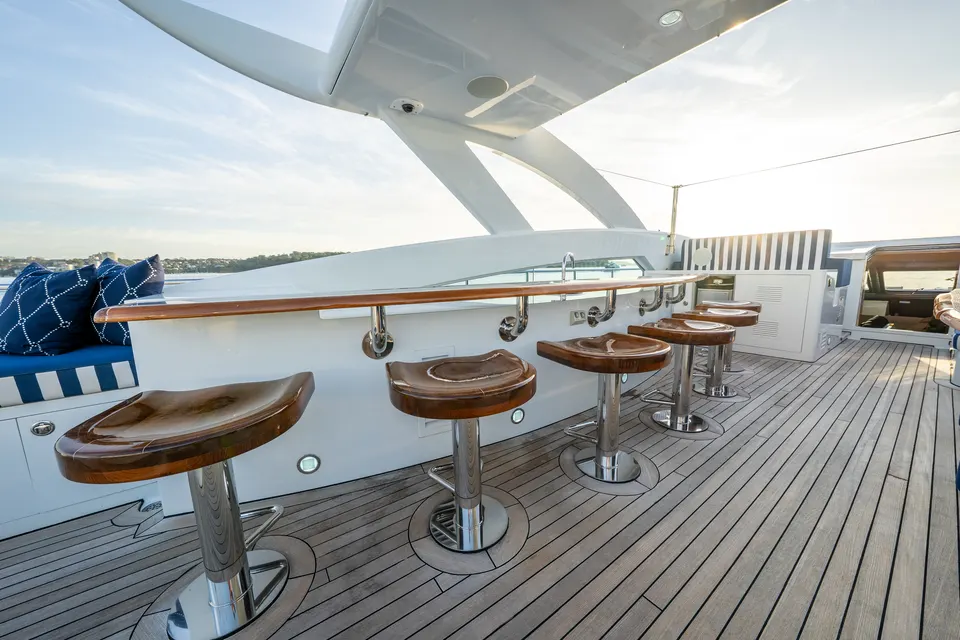 M/Y Lumir, Teak stools at the sun deck bar