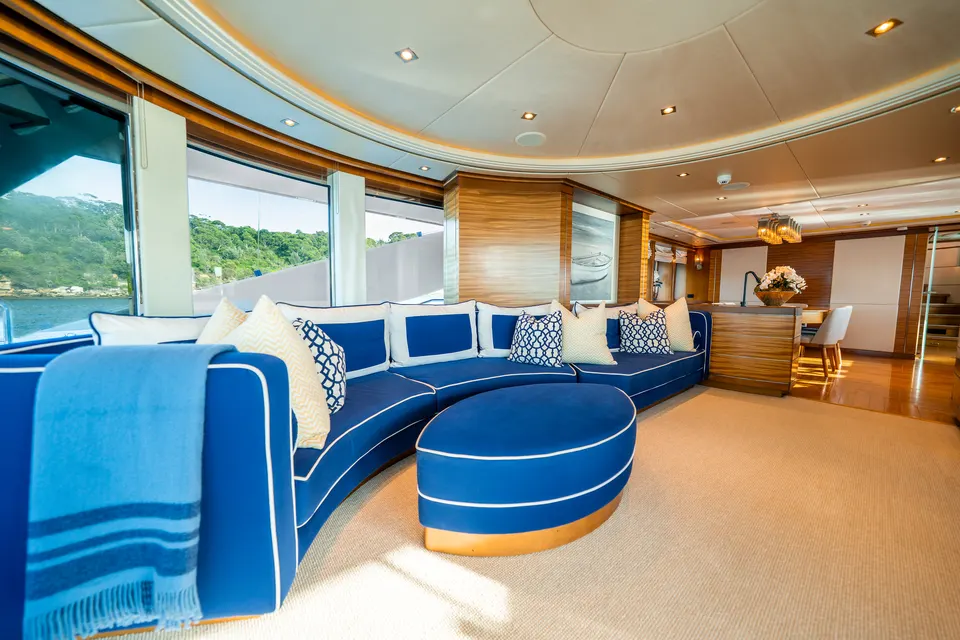 M/Y Lumir, Blue salon sofa by the windows
